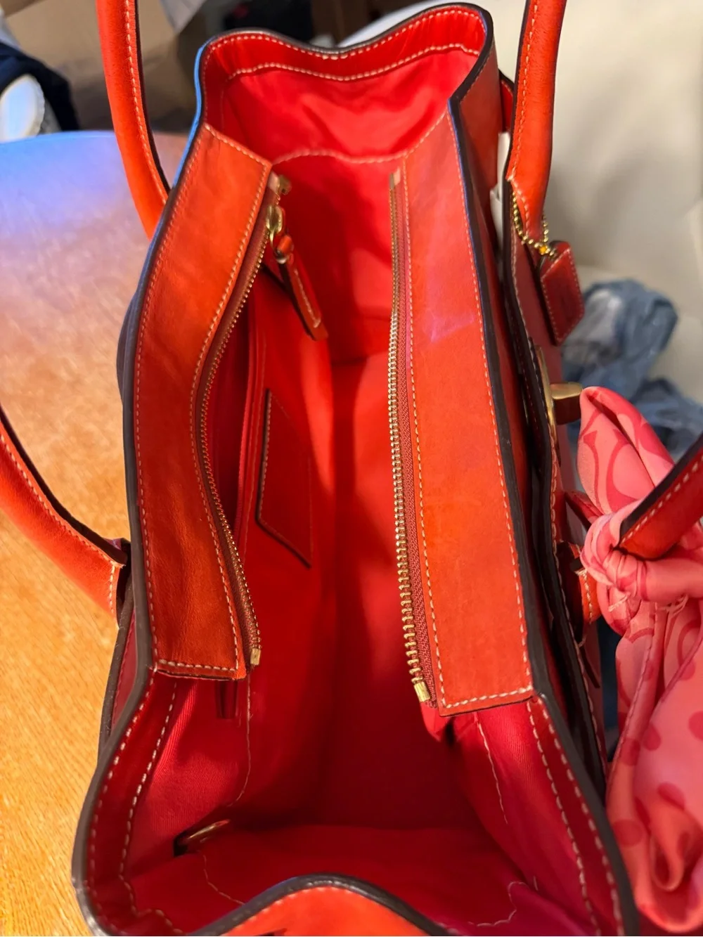 Coach Orange Leather Shoulder Bag with Pink Scarf Accent